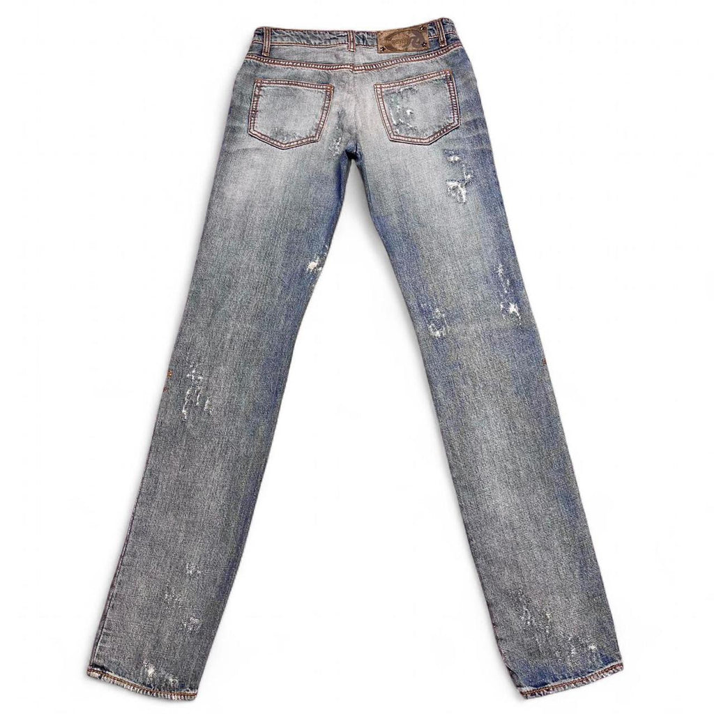 Distressed copper appliqué jeans