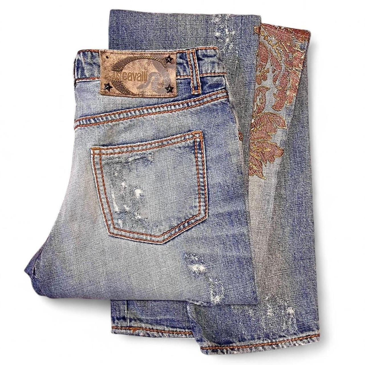 Distressed copper appliqué jeans